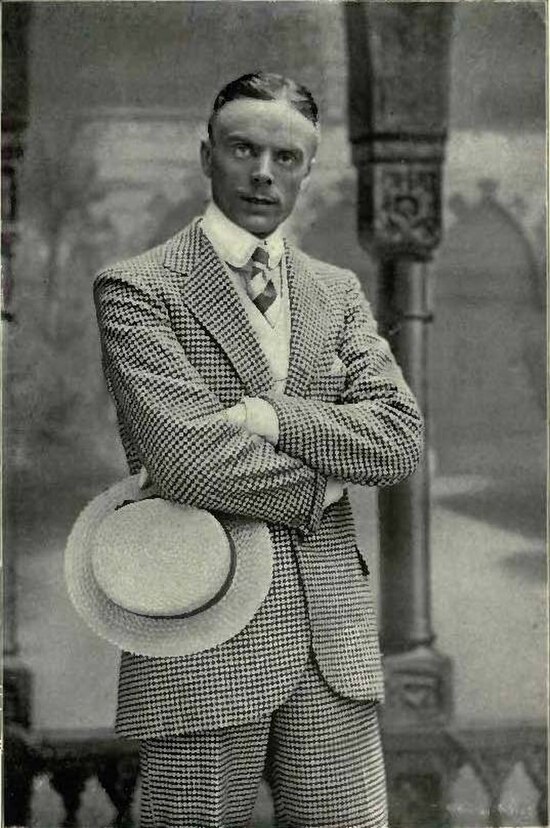 Grossmith onstage at the Gaiety Theatre