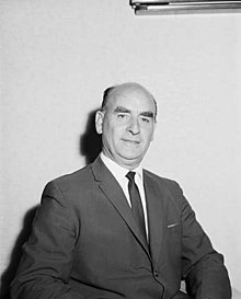 Black and white portrait of man in suit