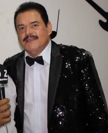 Lalo Rodriguez (pictured in 2019) achieved his only chart-topper with Un Nuevo Despertar (1988). Lalo rodriguez 2 (cropped).png