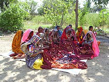 Lambani women employed by Sabala working on embroidery. Lambani embroidery.JPG