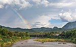 Miniatuur voor Bestand:Landscape with rainbow and the Old Bridge over the Nam Khan river in Luang Prabang Laos.jpg