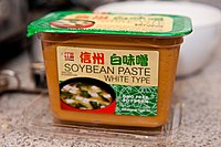 Miso is sold in storage containers.