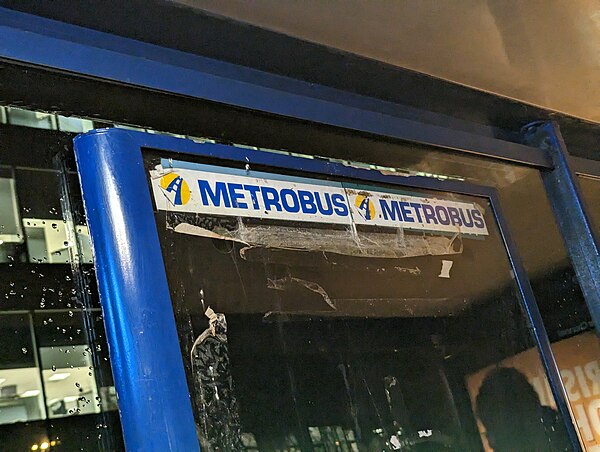 Old Metrobus logo on display in empty timetable poster frame