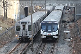 Line 2 and line 1 subway trains (from left to right)