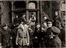 A group of "Black and Tans" and Auxiliaries in Dublin, April 1921 Outside the London and North Western Hotel in Dublin, April 21, 1921.jpg