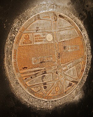 Map on a manhole in the Paris Sewer Museum.