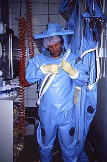 Positive pressure personnel suit Totally encapsulating, industrial protection garments worn within special biocontainment or maximum containment laboratory facilities