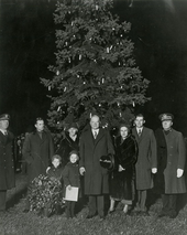 President Herbert Hoover (center) and his family in front of the National Christmas Tree on Christmas Day 1931 President Hoover and his family in front of the nation's Christmas tree, Sherman Square.png