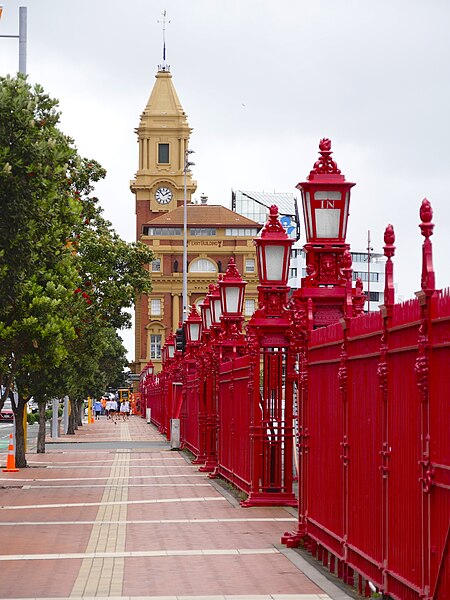 File:Queens Wharf Gates with Auckland Ferry Terminal Building.jpg