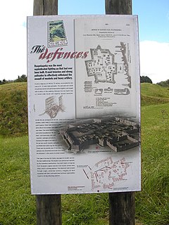 Plans of the pa, in front of its remains Ruapekapeka noticeboard and fortifications.jpg