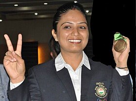 Shweta Chaudhary with medal.jpg
