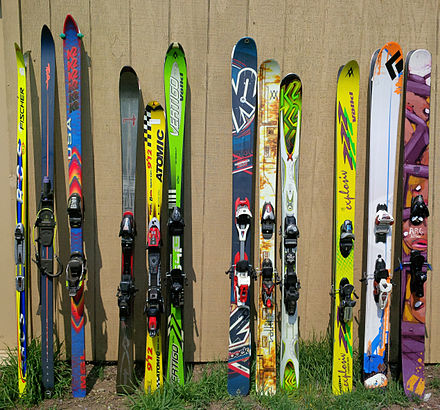 Four groups of different ski types, from left to right: Non-sidecut: cross-country, telemark and mountaineeringParabolicTwin-tipPowder