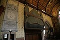 The church St. Michael and All Angels in Hughenden, High Wycombe. From the chancel. The organ and the Disraeli monument.