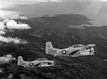 RVNAF T-28 Trojans T-28Ds VNAF over Vietnam coast.jpg