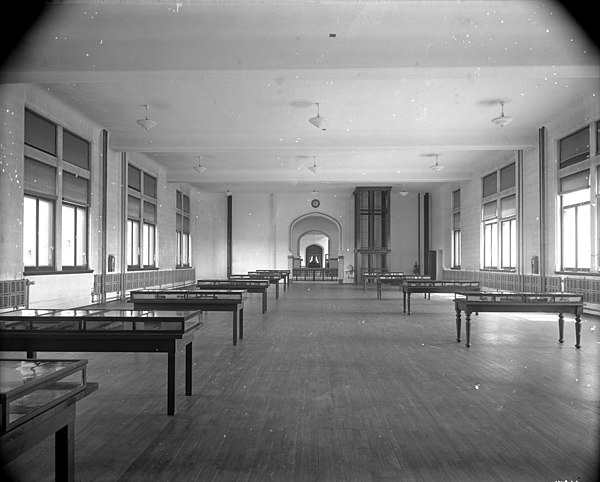 Vitrines filled with items for a temporary exhibition at the National Museum of Canada in 1912