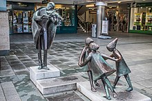The Fiddler of Dooney sculpture by Imogen Stuart in Stillorgan Shopping Centre