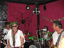 Left to right: Kitsos, Wood, Kourkounis, and Reis playing a Halloween show in 2012