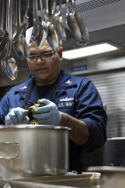 File:U.S. Navy Culinary Specialist 1st Class Eber Barraza makes guacamole in the galley aboard the guided missile cruiser USS Philippine Sea (CG 58) in the Atlantic Ocean Dec. 10, 2013 131210-N-PJ969-023.jpg