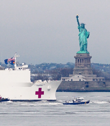 USNS Comfort passing by Statue of Liberty, March 30, 2020.png