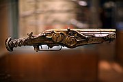 Pistol in its display case at the Metropolitan Museum of Art.