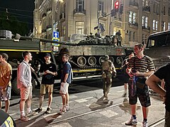 Young people next to the tank PMCs Wagner.jpg