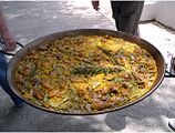 A large paella, a Valencian rice dish