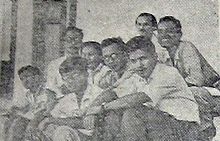 Notosusanto (centre) with several contemporary writers, including Ajip Rosidi