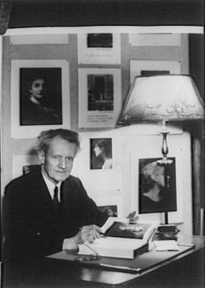 File:Arnold Genthe seated at his desk with a copy of his autobiography As I remember LOC agc.7a09572.tif