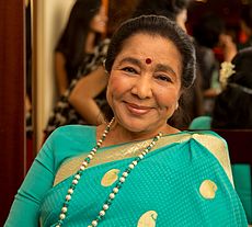 A woman wearing White saree.