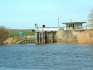 Flood protection weir at the mouth of the river in the Ouse