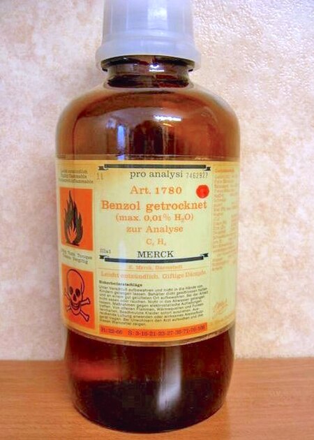 A bottle of benzene. The warnings show benzene is a toxic and flammable liquid.