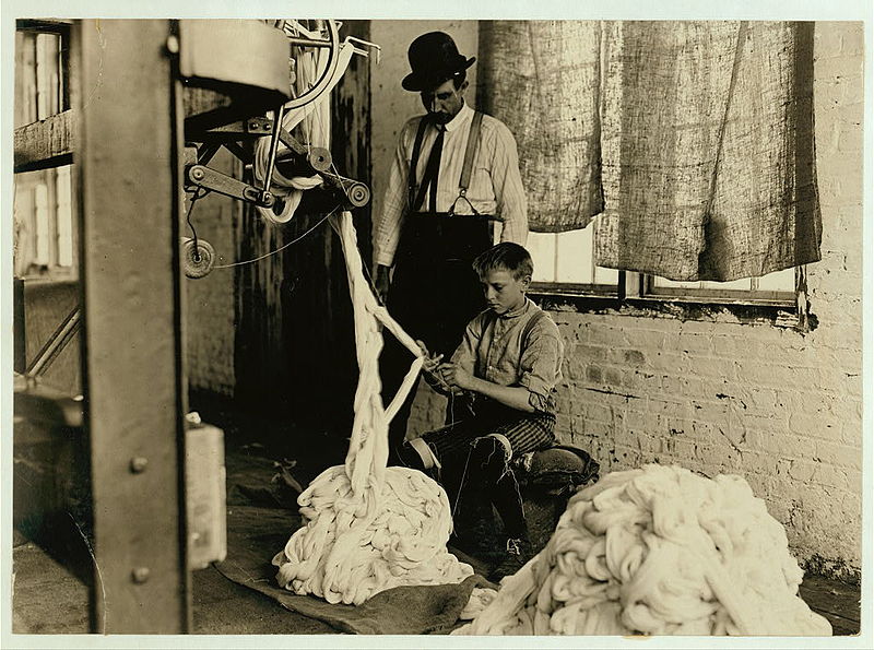 File:Boy at warping machine.jpg