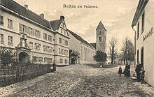 The former abbey and monastic church in the late 19th century Buchau. View of former Imperial abbey, circa 1900.jpg