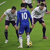 Acclaimed for his dribbling, creativity and ball retention skills, the FIFA website regards Hazard as being "difficult to dispossess." Chelsea 1 Everton 0 (16325064577).jpg