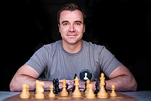 Rensch in 2022 Danny Rensch with chessboard.jpg