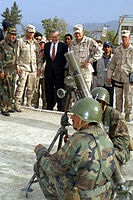 Rumsfeld with Major General Karl Eikenberry during a visit to Afghan Army Military Training Center in Kabul, Afghanistan on May 1, 2003.