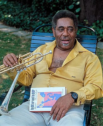 Gillespie holding memoir To Be or Not to Bop published in 1979 Dizzy Gillespie holding memoir "To Be or Not to Bop".jpg