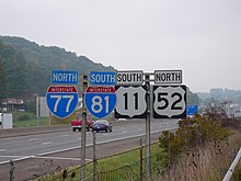 Sign on I-81/I-77 indicating a double wrong-way concurrency near Fort Chiswell, Virginia. DoubleWrongWayConcurrencyVA.jpg