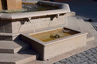 Horse trough on northwest side of the fountain, with the inscription "Good citizens are the riches of a city" above Drinking trough on northwest side of Skidmore Fountain.jpg