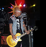 Left Alone vocalist Elvis Cortez with a liberty spike mohawk