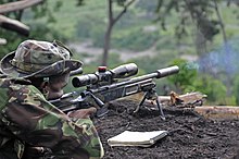 Brazilian sniper firing his RPA Rangemaster 7.62 rifle during the 2011 Fuerzas Comando" (Commando Forces) contest. Flickr - DVIDSHUB - Angle shooting event at Fuerzas Comando 2011 (Image 2 of 5).jpg