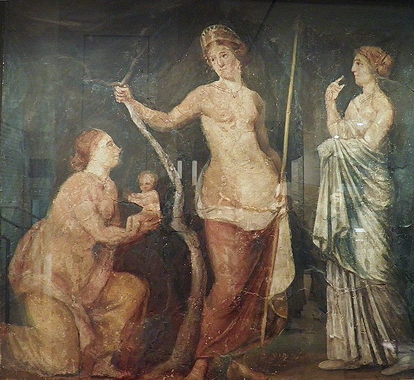 A woman, perhaps Juno Lucina, goddess of childbirth, presents the goddess of love, Aphrodite (Roman Venus) with the beautiful infant Adonis.