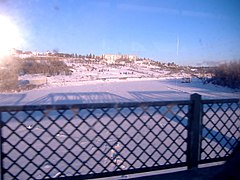 The river covered in a sheet of ice in Edmonton