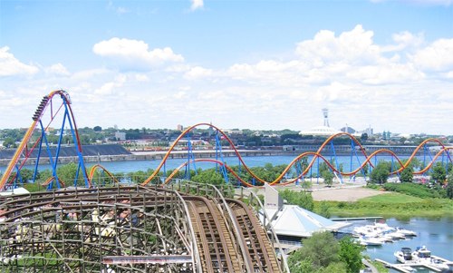 Goliath is one of eight roller coasters at the park. The park's wooden roller coaster, Le Monstre is visible in the foreground.