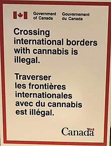 A sign at Billy Bishop Toronto City Airport reminds passengers departing for the United States that carrying cannabis across international borders remains illegal under Canadian law. Government of Canada (Gouvernement du Canada) cannabis sign at Billy Bishop Toronto City Airport (YTZ) gate on 19 October 2018 (cropped).jpg