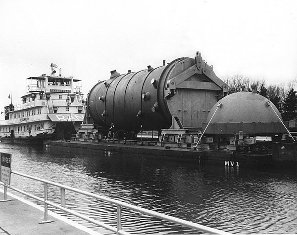 A reactor vessel body and vessel head being shipped to Dresden Generating Station