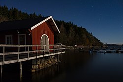 Moonlight illuminates a boat club in Holma, Sweden. Holma Boat Club by the light of the moon.jpg