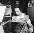 Katharine Burr Blodgett (1898-1979), demonstrating equipment in lab.jpg