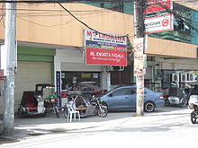 Pawnshops are a common place to send and receive remittance in the Philippines. M Lhuillier Shop.jpg