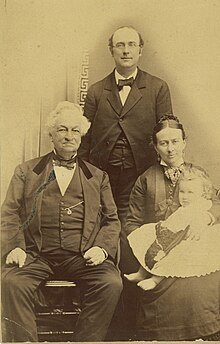 A period photograph of Pequot Library founder Virginia Marquand Monroe, Frederick Marquand, as well as husband Elbert and child. Marquand Monroe Family.jpg